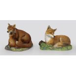 Pair of English Hand Painted Ceramic Fox Sculptures