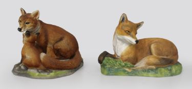 Pair of English Hand Painted Ceramic Fox Sculptures