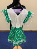 Green and white dressing up Spanish dress