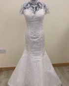 Eternity Bridal fitted wedding dress size 10 in ivory. Lace