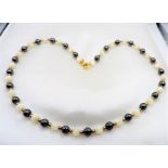 17 inch Hematite White Jade Gold Bead Necklace