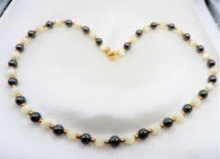 17 inch Hematite White Jade Gold Bead Necklace