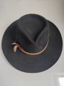 An Akruba Snowy River Australian Hat With Band and Feather