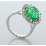18ct White Gold cushion Emerald and Diamond Cluster Ring (7.99) 1.07 Carats