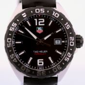 TAG Heuer / Formula 1 Date - Gentlemen's Steel Wristwatch
