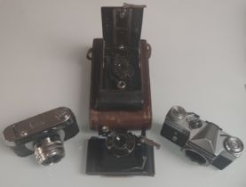 A Collection of 4 X Old Vintage Cameras – Kodak – Brownie – Zenit – Halina.