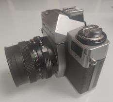 A Praktica LB 35mm SLR Camera With 1.8/50 Lens and Case.