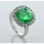 18ct White Gold Cushion Emerald and Diamond Cluster Ring (7.99) 1.07 Carats