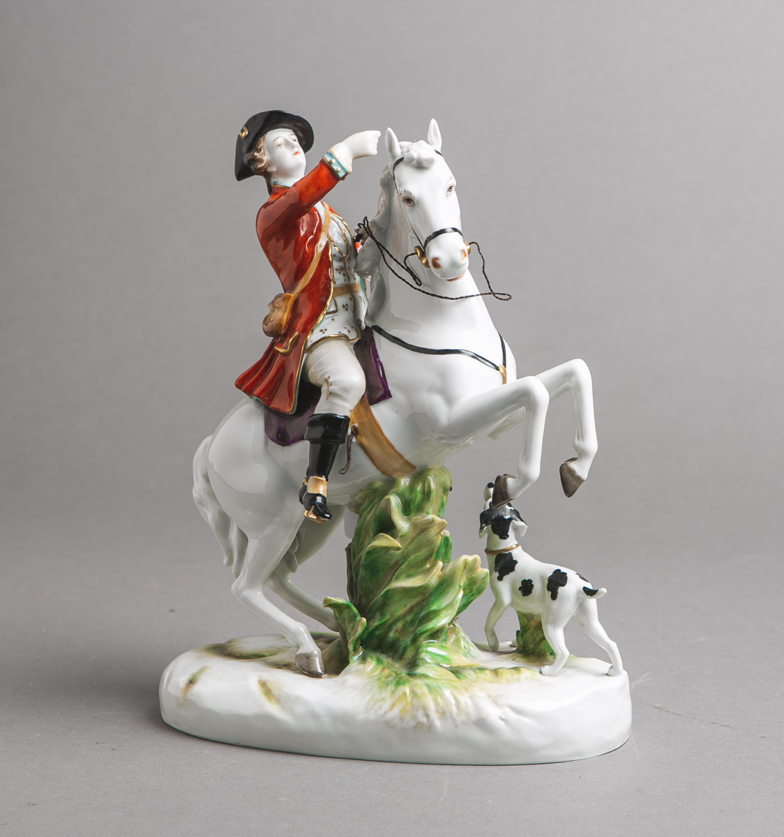 Porzellanfigur "Reiter auf seinem Ross mit Jagdhund" (Volkstedt)