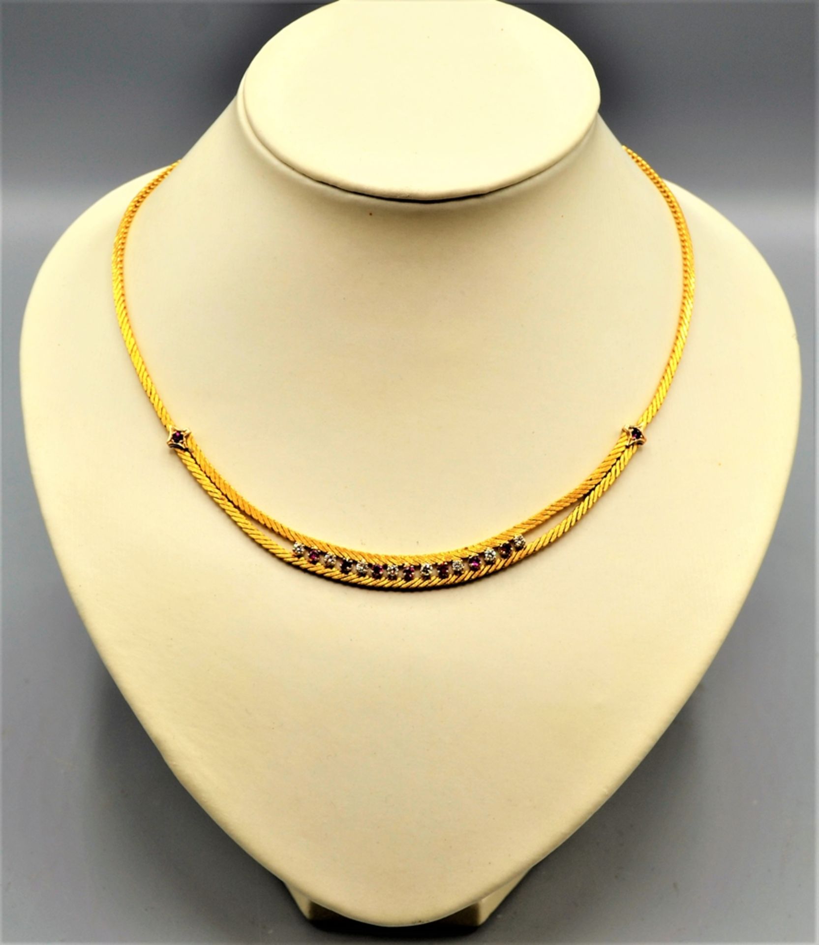 Rubin Brillanten Collier 750 Gold, 9 Rubine, 8 Brillanten, ca. 47 cm, 34,4 g