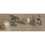 A PAIR OF CHANEL FAUX PEARL EARRINGS