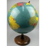 A TERRESTRIAL GLOBE BY PHILLIPS, circa 1930 mounted on mahogany base. Siam instead of Thailand (pre