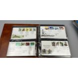 THREE ALBUMS OF STAMPS AND FIRST DAY COVERS