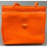 A GIANNI VERSACE ORANGE LEATHER HANDBAG, 25cm x 22cm x 10cm