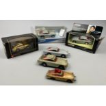 CORGI TOYS A SET OF SIX JAMES BOND ASTON MARTINS, three boxed and three as seen. To include Aston