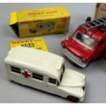 DINKY TOYS A COLLECTION OF FOUR BOXED, to include Dinky Triumph Spitfire 114 in red, Dinky Daimler