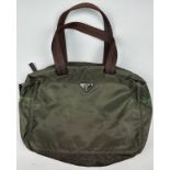 A PRADA KHAKI BAG, with inner and outer zipped compartments. 36cm x 28cm x 10cm