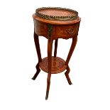 AN EARLY 20TH CENTURY FRENCH JARDINIERE, with marquetry inlay and brass galleried top.