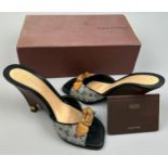 A PAIR OF LOUIS VUITTON HEELS, with monogram canvas in box.