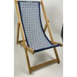 A BURBERRY RECLINING DECK CHAIR, with blue and white interlocking 'B' monogram. 104cm x 104cm