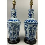 A PAIR OF CHINESE BLUE AND WHITE VASES OF PAINTED FOLIATE DESIGN, adapted into lamps.