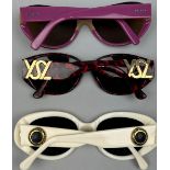 A SET OF THREE DESIGNER SUNGLASSES, to include Yves Saint Laurent, Prada and Fendi (3)