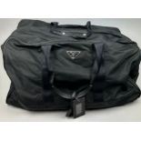 A LARGE PRADA HOLDALL 78cm x 30cm x 36cm