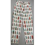 A RARE PAIR OF 1980'S VERSACE POP ART ANDY WARHOL MANNER LADIES 'BOTTLE' TROUSERS 28' x 28'