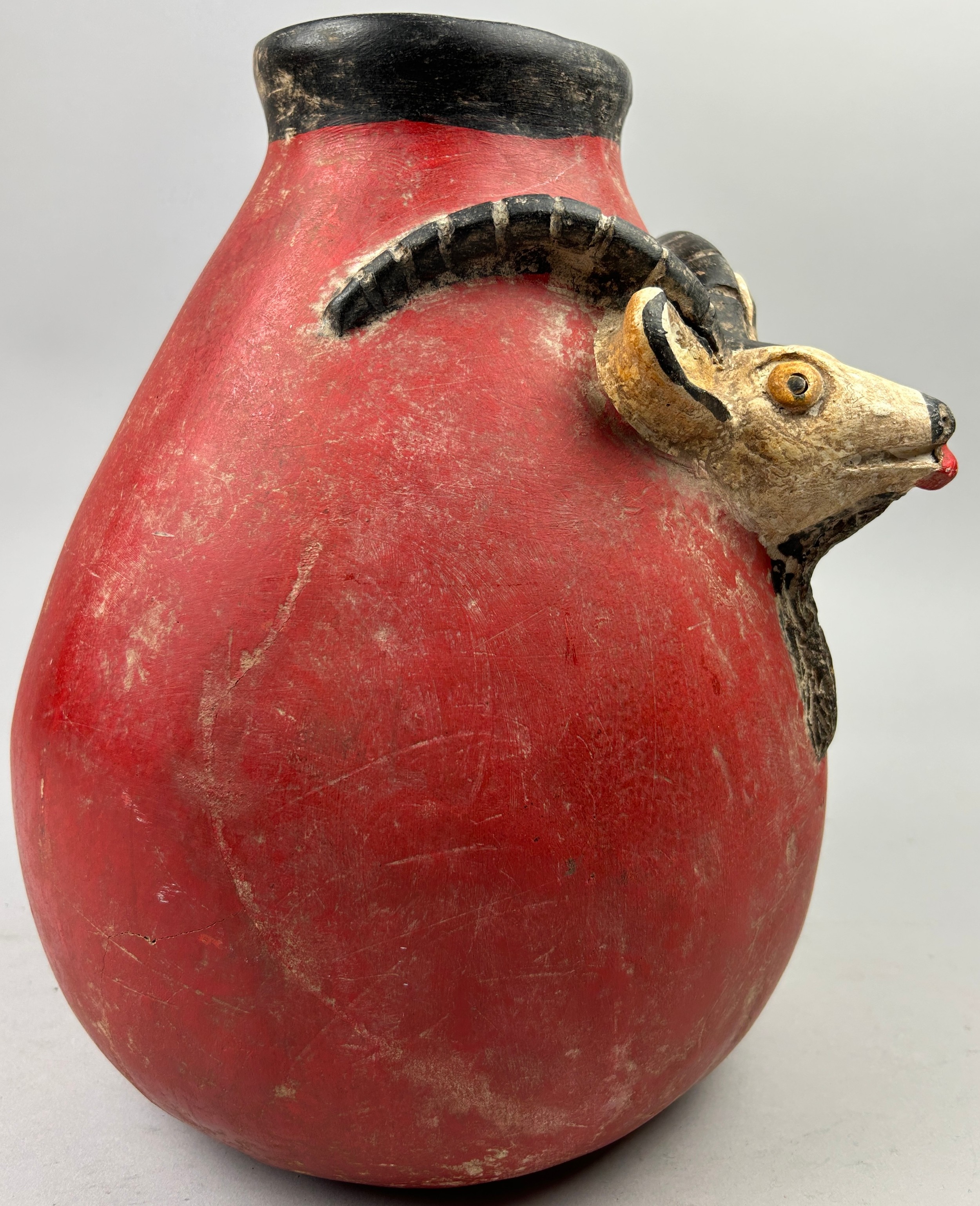 A PRE-COLUMBIAN STYLE JUG, modern after the antique with vivid red earthenware glaze and figure of a - Image 3 of 4