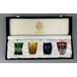 A SET OF FOUR BOXED FABERGE SHOT GLASSES