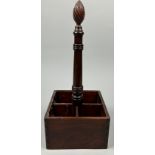 A 19TH CENTURY MAHOGANY BOTTLE HOLDER, for four bottles, with carved fir cone handle.