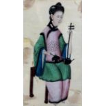 A CHINESE STUDY OF A GIRL IN TRADITIONAL ROBES PLAYING A MUSICAL INSTRUMENT,