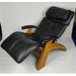 A RECLINING LEATHER ARMCHAIR BY 'THE PERFECT ARMCHAIR' COMPANY,