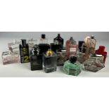 A COLLECTION OF PARTIALLY USED DESIGNER PERFUME BOTTLES, to include Gucci, Dior, Armani and more (