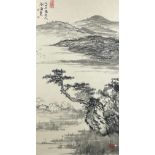 A LARGE CHINESE INK AND WATERCOLOUR OF A RIVER WITH TREES AND A LOOMING MOUNTAIN,