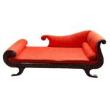 AN EMPIRE DESIGN CHAISE LOUNGE OR DAY BED, in the Regency style upholstered in red fabric with
