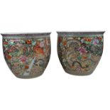 A PAIR OF LARGE CHINESE PLANTERS, with painted decoration depicting a fire breathing dragon and