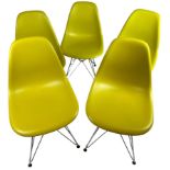 A SET OF FIVE CHARLES AND RAY EAMES FOR VITRA DSR CHAIRS, plastic and chrome in yellow.