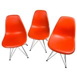A SET OF THREE CHARLES AND RAY EAMES FOR VITRA DSR CHAIRS, plastic and chrome in red
