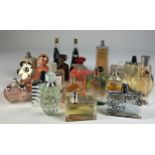 A COLLECTION OF PARTIALLY USED DESIGNER PERFUME BOTTLES, to include Prada, Marc Jacobs, Guess and