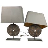 A PAIR OF DESIGNER IRON CIRCULAR WHEEL LAMPS,