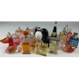 A COLLECTION OF PARTIALLY USED DESIGNER PERFUME BOTTLES, to include Versace, Tommy Hilfiger,