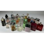 A COLLECTION OF PARTIALLY USED DESIGNER PERFUME BOTTLES, to include Gucci, Chanel, Christian Dior,