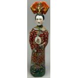 A CHINESE PORCELAIN NODDING HEAD FIGURE WITH CHARACTER SEAL TO BASE, depicting a member of the court