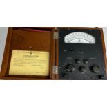 A MODEL 44A PRECISION MULTI RANGE METER, in teak case.