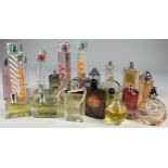 A COLLECTION OF PARTIALLY USED DESIGNER PERFUME BOTTLES, to include Valentino, Yves Saint Laurent,