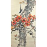 A LARGE CHINESE INK AND WATERCOLOUR PAINTING ON PAPER OF A BIRD IN A BLOSSOM TREE, with