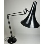 A LARGE BLACK STANDARD LAMP