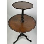 A VICTORIAN PIECRUST TWO TIER TABLE, on three legs 110cm in height