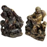 TWO CHINESE HARDSTONE FIGURES, depicting figures at worship with Foo Dogs. Numbered to verso (2)